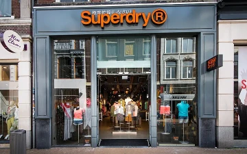 Overname noodlijdende modeketen Superdry ketst af