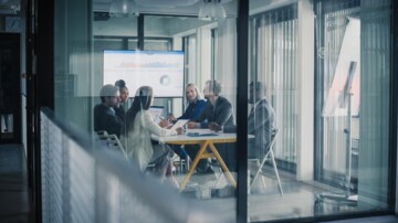 Welke 20 dealmakers doen de meeste large cap (>250 miljoen euro) deals?